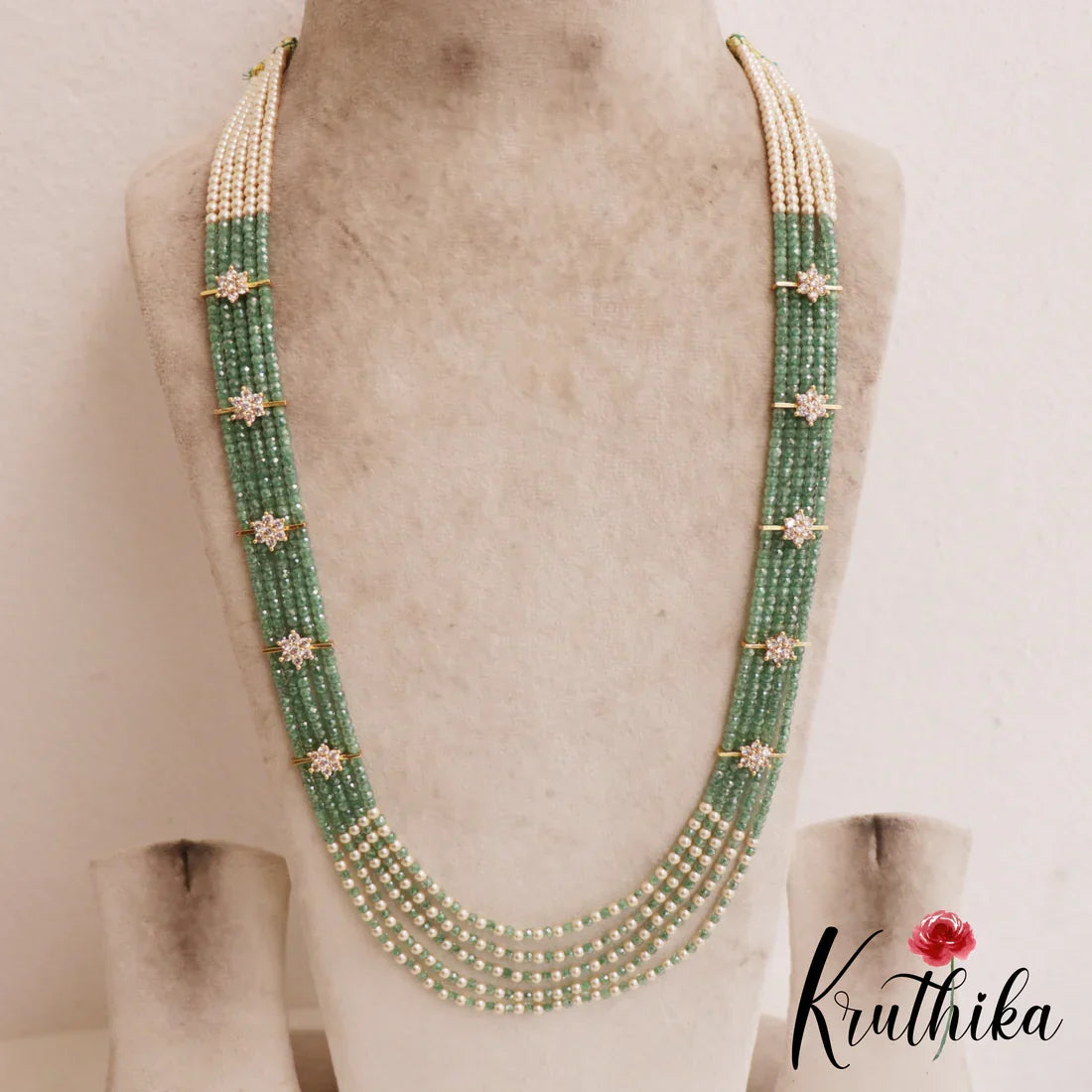 Sparkling Multi Layered crystal & Pearl statement Haaram with floral accents