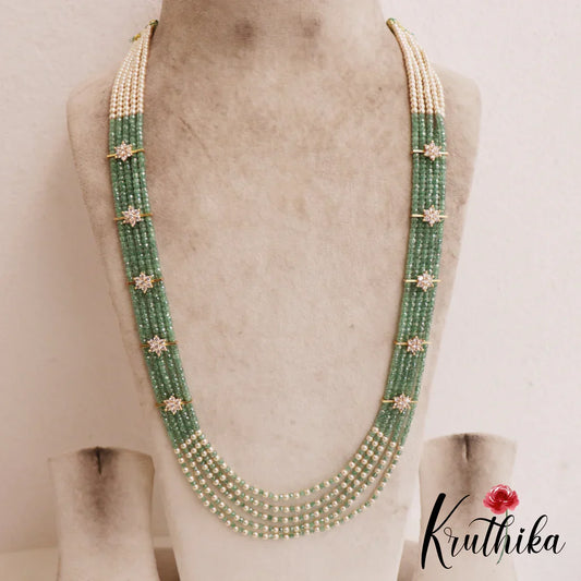 Sparkling Multi Layered crystal & Pearl statement Haaram with floral accents